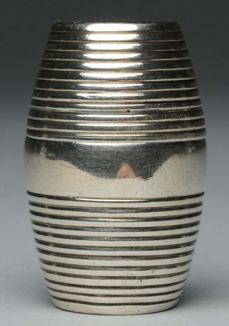 English Silver Nutmeg Grater.: In the shape of a barrel with hooped sides, Thomas Meriton, London 1797, the inside with a steel grate. Very good condition. Height: 1-1/2 in.