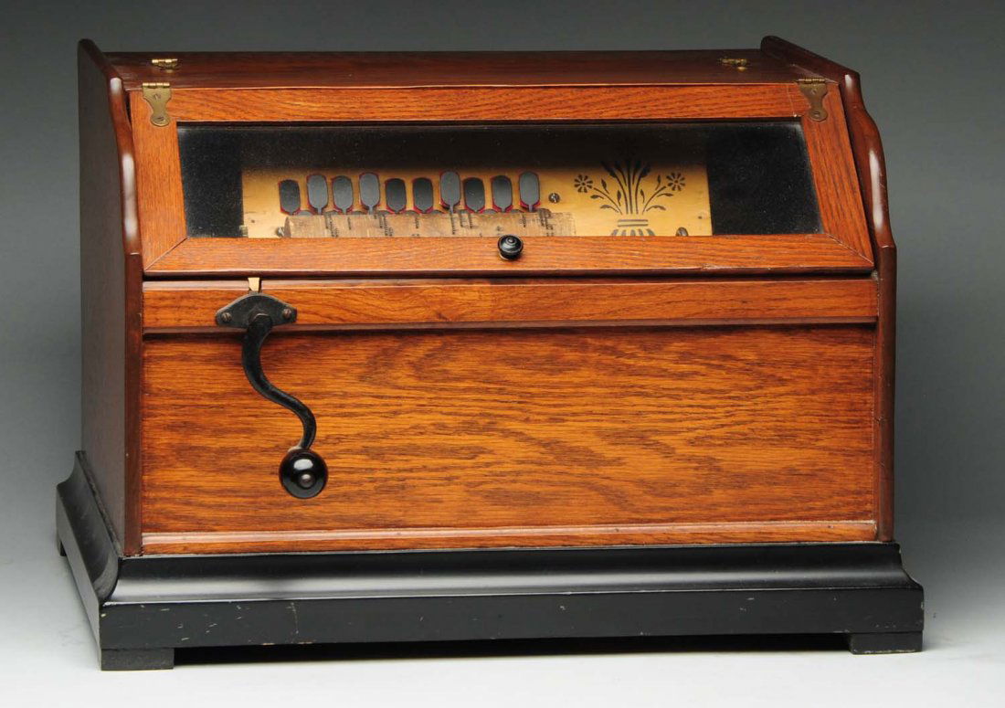 Concert Roller Organ.: Includes 5 cobs. Completely refinished case and all exterior case stencils have been removed. Bellows are airtight and the sound is loud. Plays very nice. Interior instruction label is 90% intact. Con