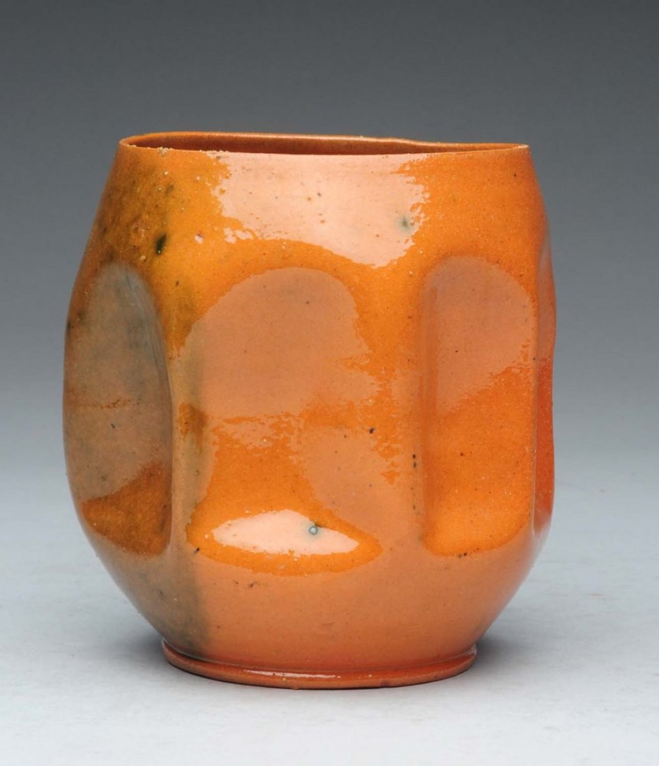 George Ohr Potter.: Two-tone brown vase is signed "G.E. Ohr, Biloxi, Mississippi". The piece has an unusual form and no damage. Great color. Condition (Excellent). Size 5" T.