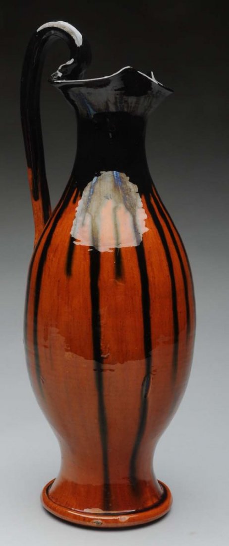 Carolina Cole Pottery Rebecca Pitcher.: Impressed A.R. Cole. Sanford, NC. Orange/red glaze with black drips. Condition (Excellent). Size 17" T.