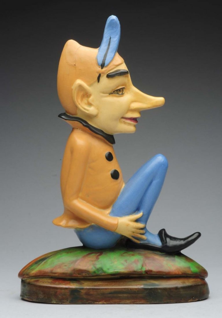 Weller Gnome on Coppertone Base.: Impressed "Weller Pottery" under base. Factory clay separation on head. Restoration to middle where man meets base. Restoration to nose. Condition (Fair). Size 14" T.