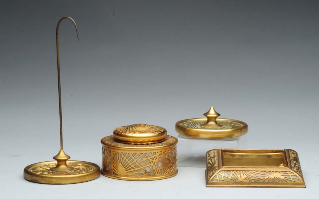 Tiffany Studios Pine Needle Desk Set.: Inkwell with original insert No. 846, paperweight No. 936, bill file No. 961, calendar frame No. 930. there is minor wear to the gold, no calendar pages, and the inkwell is missing a bottom screw. Con