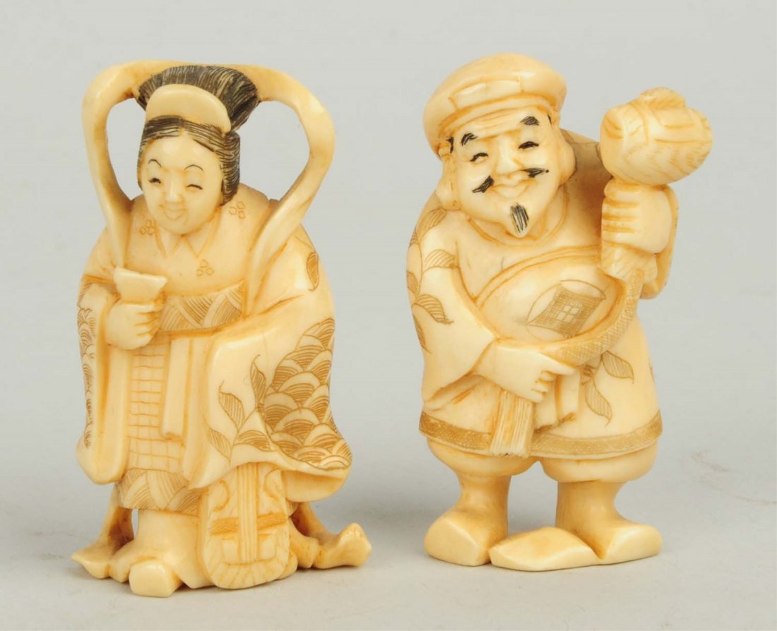 Lot of 2: Ivory Netsukes.: A man and a woman. Size Each: 2" T.