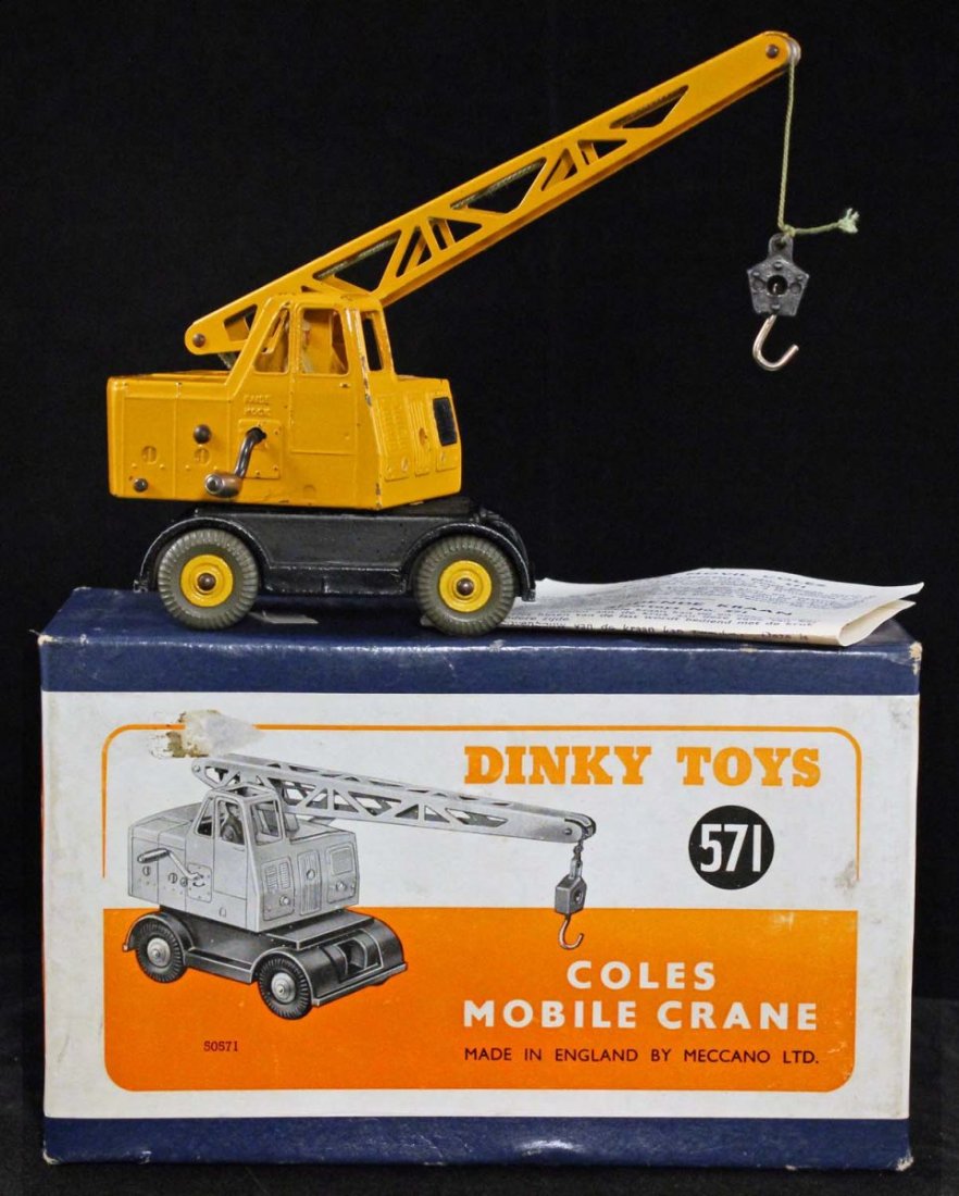 Dinky Toys Coles Mobile Crane.: No. 571, circa 1949, Meccano, England. Yellow and black. Box has inserts. Condition (C8 Excellent - C8.5 Excellent Plus). Size 7" L.