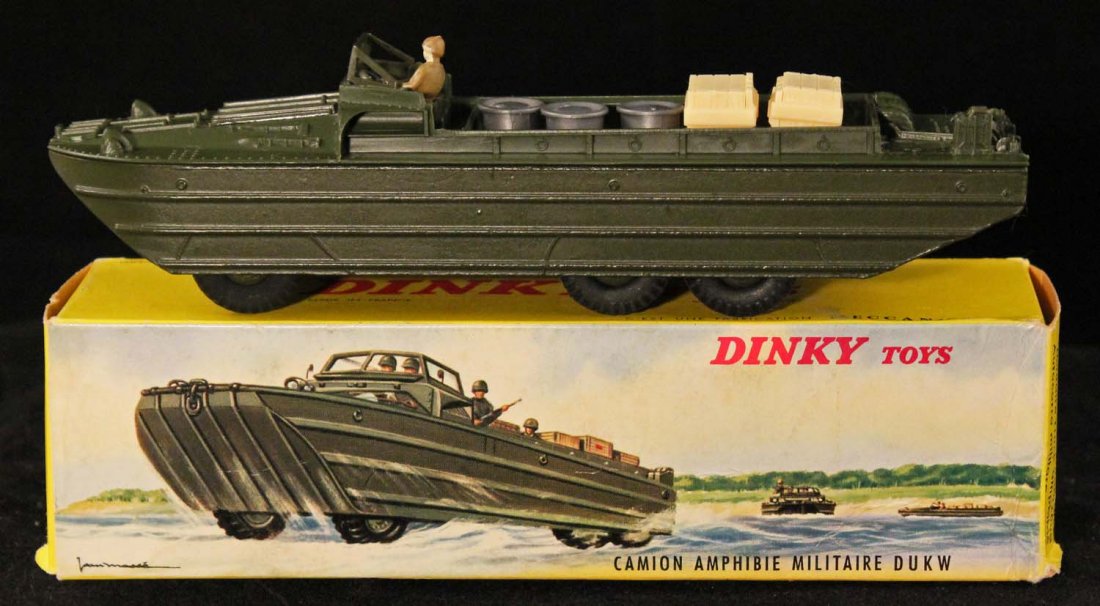 Dinky Toys DUKW Amphibian Military Boat.: No. 825 in box, circa 1963, Meccano, France. Green open top body complete with all accessories. Condition (C8 Excellent - C9 Near Mint). Size 7" L.