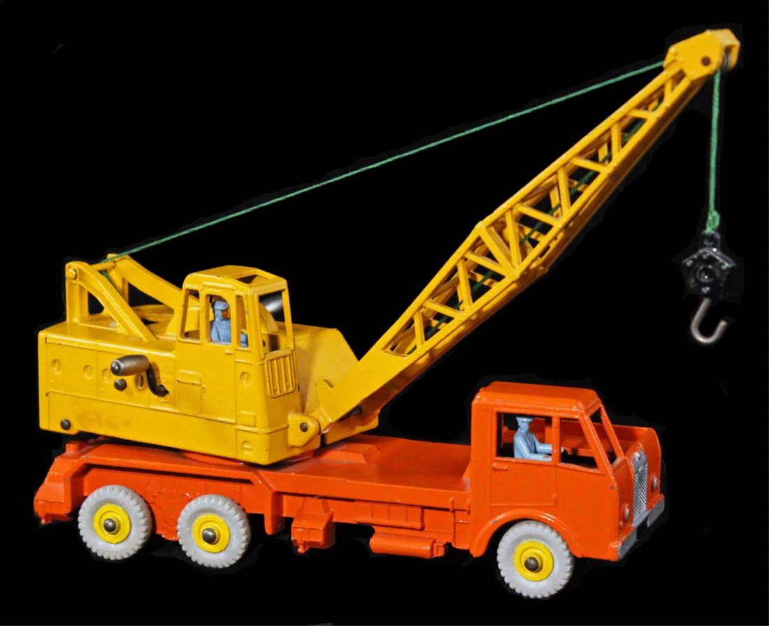 Dinky Toys 20 Ton Lorry Mounted Crane.: No. 972, circa 1955, Meccano, England. Orange lorry, yellow crane. Scattered small chips. Condition (C9 Near Mint). Size 9" L.