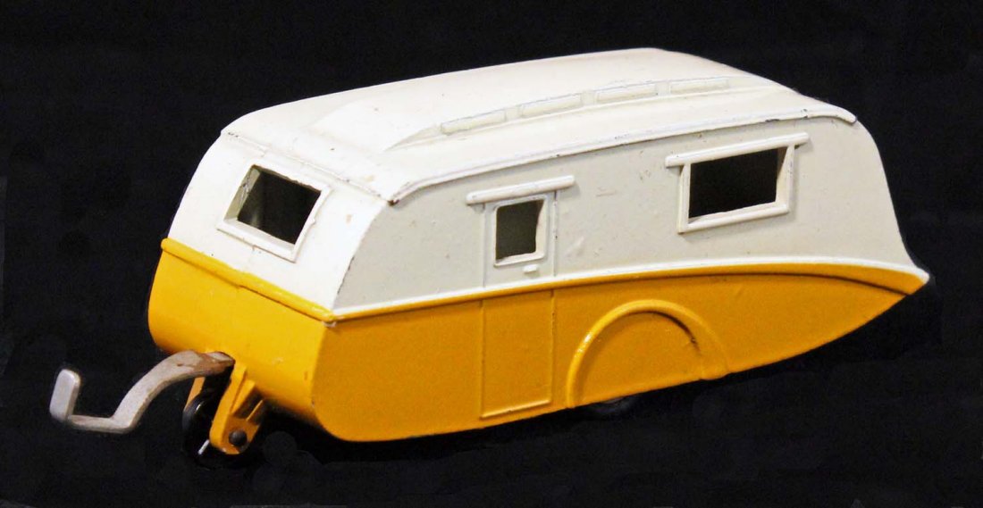 Dinky Toys Caravan Trailer.: No. 190, 1956, Meccano, England. Two tone trailer, mustard yellow and cream. Minor scuffs. Condition (C9 Near Mint). Size 4 - 1/2" L.