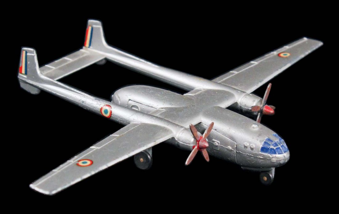 Dinky Toys Nord Noratlas Plane.: No. 804, circa 1960, Meccano, France. Silver, French markings and scattered scuffs. Condition (C8 Excellent). Size 7" L.