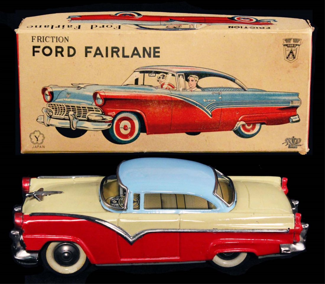 1955 Ford Fairlane Crown Victoria Coupe.: In box, circa 1950s, Yonezawa, Japan. Beige, red and light blue tin friction with detailed litho interior, near mint in an excellent box. Condition (C8.5 Excellent Plus - C9 Near Mint). Size 8" L.