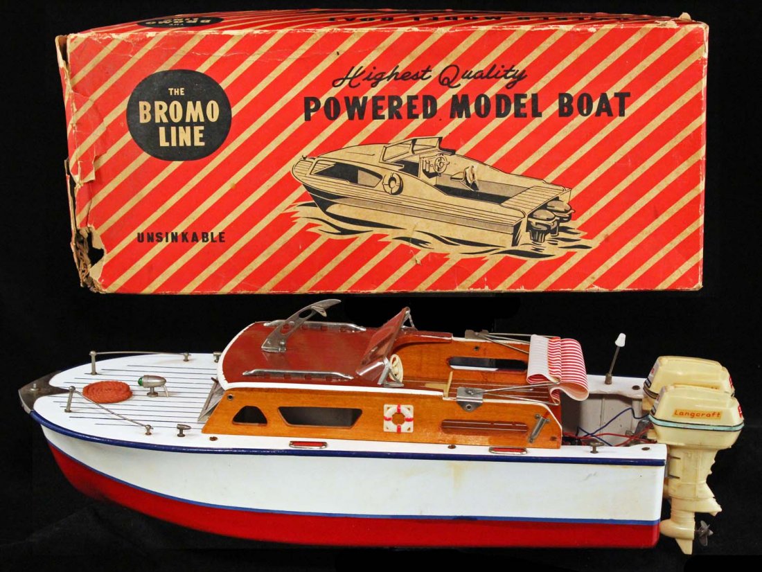 Highest Quality Powered Model Boat.: Circa 1950s. Has dual outboard motors. The Bromo Line, Japan, 17. Unsinkable painted plastic hull with wood decks and cabin. Metal details with two battery operated engines. Toy is clean, but battery 