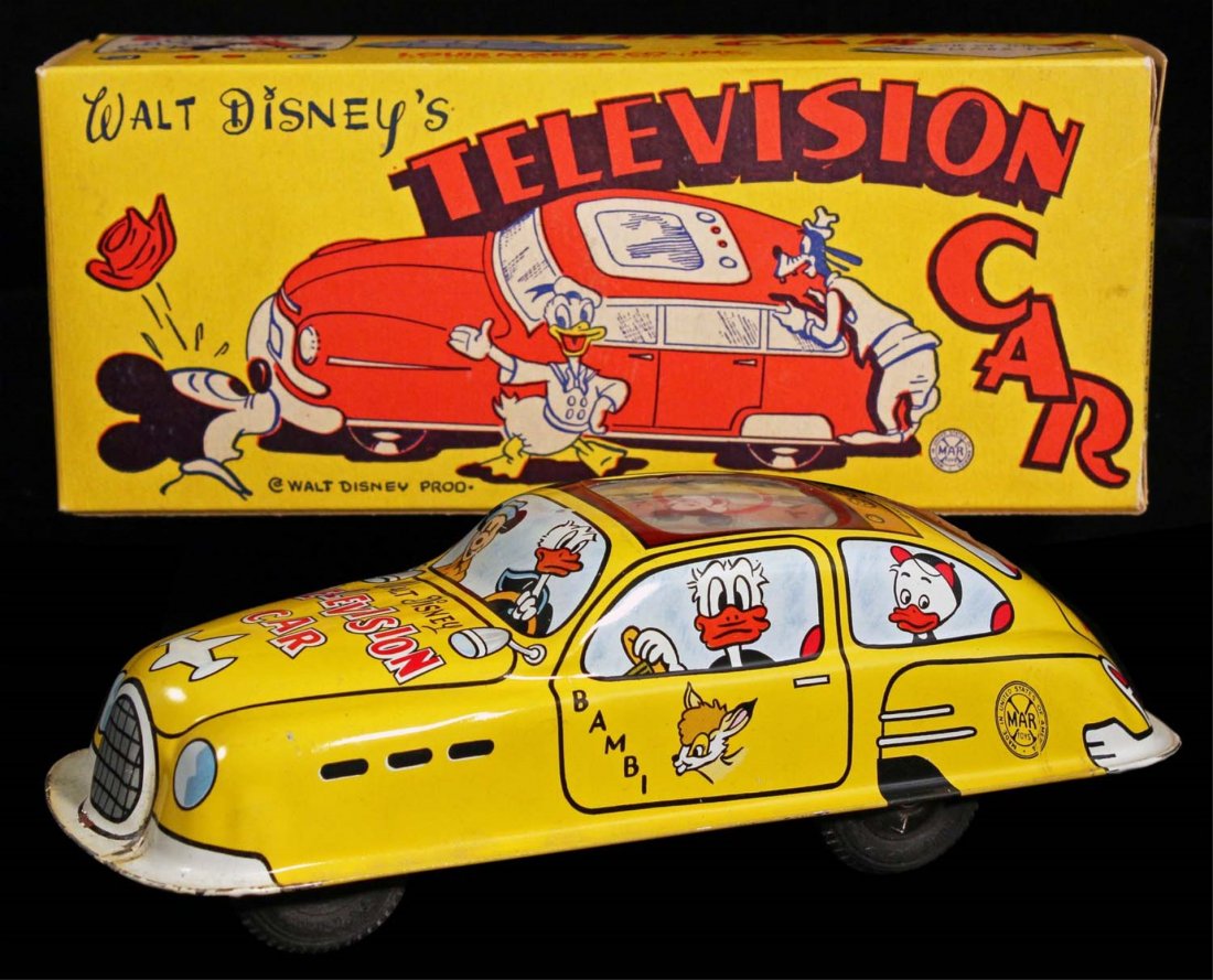 Marx Tin Litho Walt Disney’s Television Car.: Circa 1950s. Lithographed tin with sparking TV screen on roof. Crisp box. Spectacular example of this scarce toy. Condition (C9 Near Mint). Size 7 - 1/2" L.