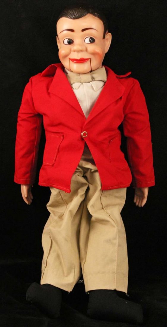 Paul Winchell's Jerry Mahoney Ventriloquist Doll.: Circa 1950s. Juro Novelty Co., NY. Painted vinyl head with moving mouth, red jacket, beige pants and bow tie. Missing shoes, otherwise very clean. Condition (C9). Size 24" L.