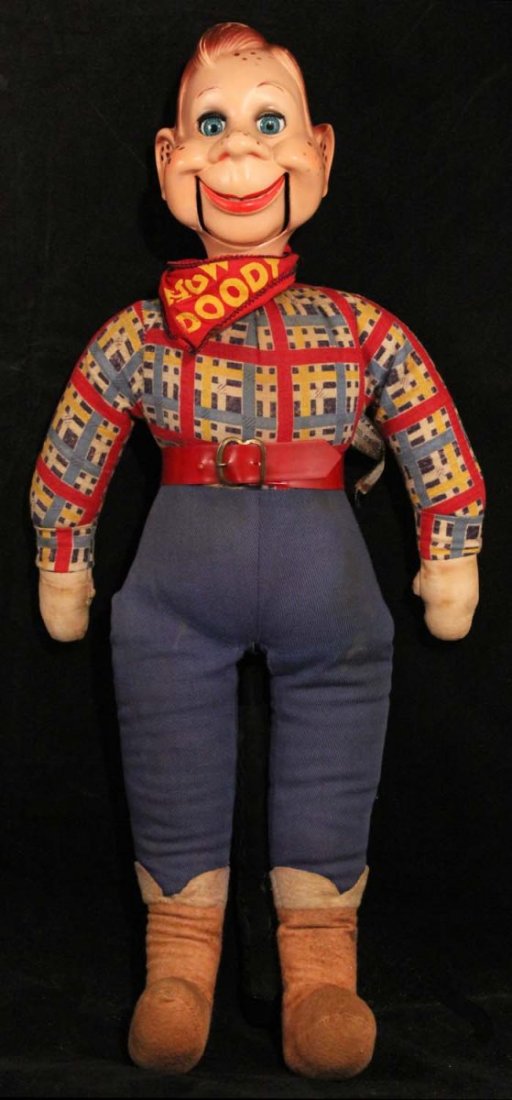 Ideal Howdy Doody Ventriloquist Doll.: Circa 1950s. Stuffed cloth body with composition head and sleeping blue eyes. Jaw moves by pulling string in back. A few light stains on body. Head is very clean with only minor paint loss to hair. Co