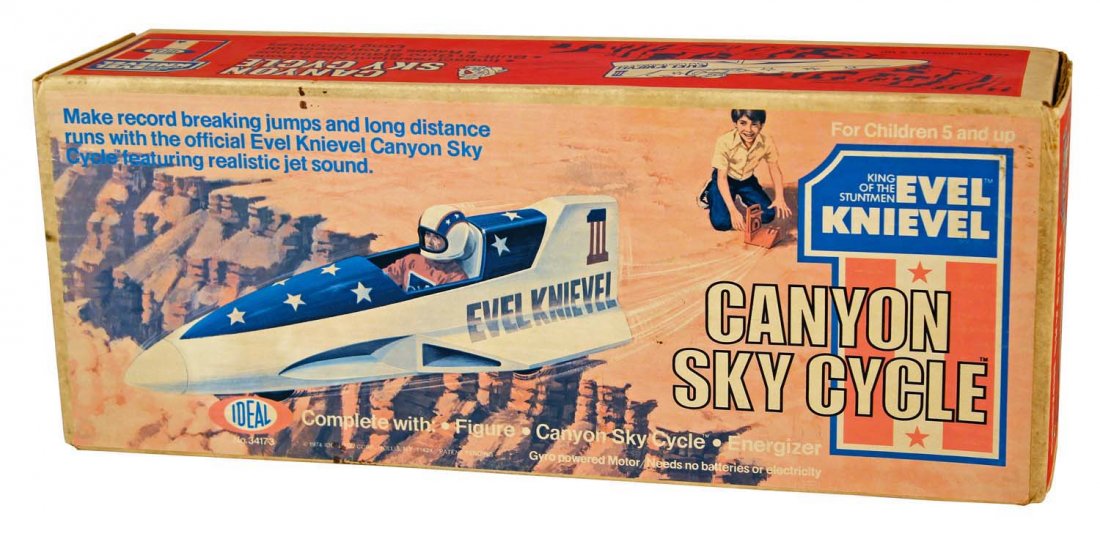 Evil Knievel Canyon Sky Cycle.: In factory sealed box, circa 1974, Ideal. The label has faded, otherwise the box is crisp and clean. Condition (C8 Excellent) Size 18" x 5".