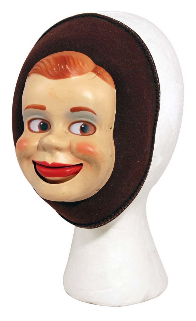 Jerry Mahoney Ventriloquist Beanie Cap.: Circa 1950s, Benay–Albee Novelty Company. Painted molded thin plastic face with moveable mouth, on a 100% recycled felt cap; 1” crack at top right of his face, but no missing pieces; strong color