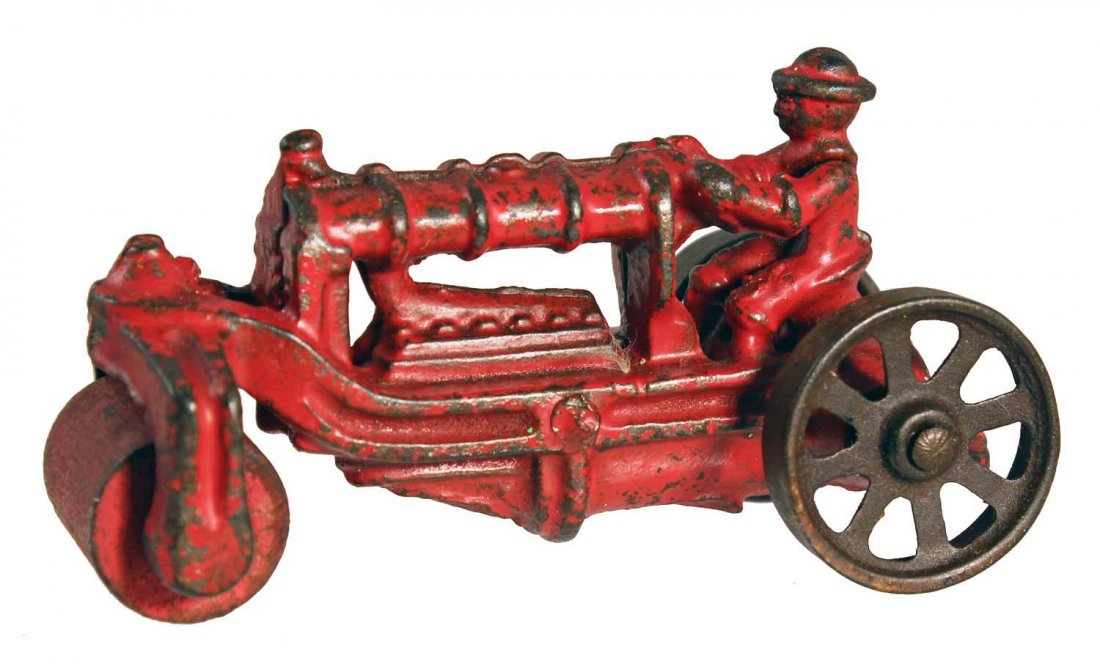 Road Roller.: Circa 1930s, AC Williams. Painted cast iron with painted wood front roller; edge wear. Condition (C7 Very Good).