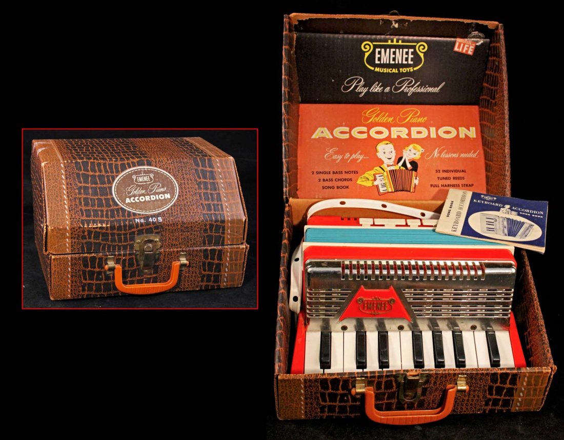 Golden Piano Accordion”.: Circa 1955, Emenee Musical Toys. No. 405, printed cardboard simulated alligator–skin carrying case contains a working plastic child’s accordion and song book; appears to be unused, but the plastic