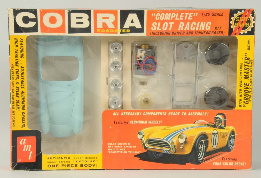 AMT Cobra Roadster Slot Car Kit.: 1/25 scale. New in box. Blue body. Condition (Excellent). Size 12" L.