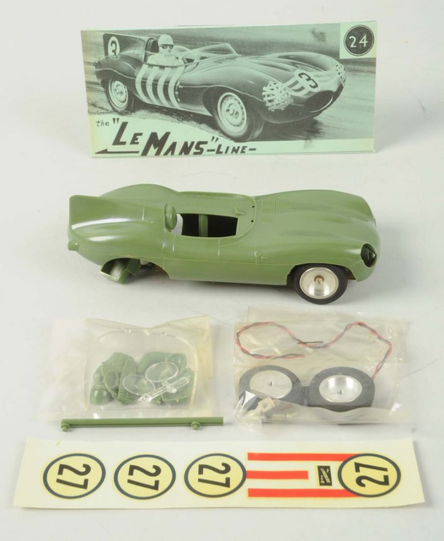Unique Engineering Le Mans D Jaguar Slot Car Kit.: 1/24 scale. New in box. Condition (Good). Size 7" L.