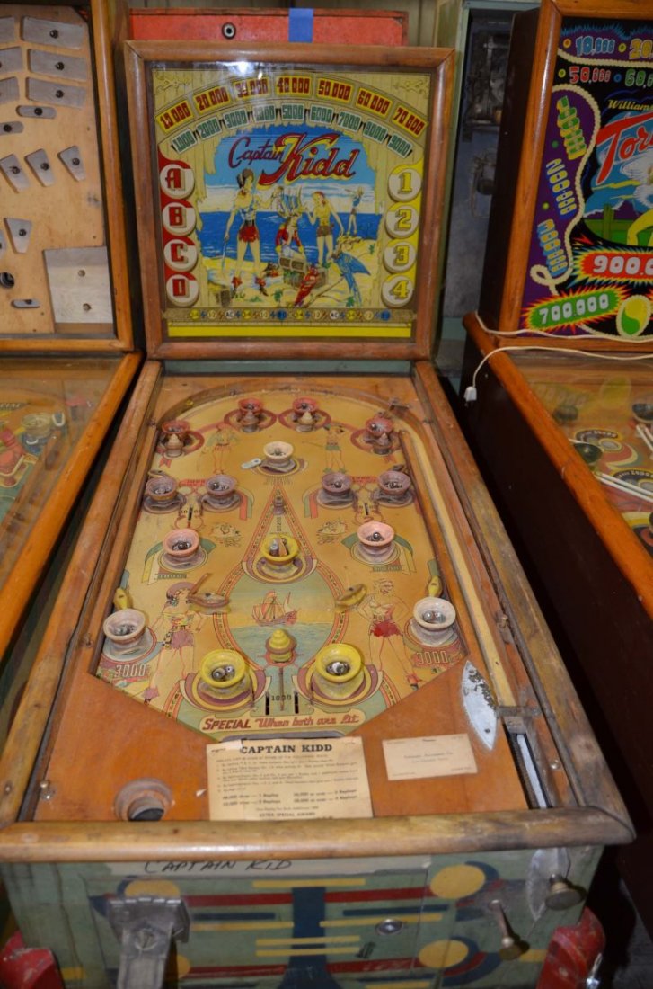 1941 Genco Captain Kidd.: Playfield: Fair. Backglass: Good. Cabinet: Fair. Functionality: Untested.