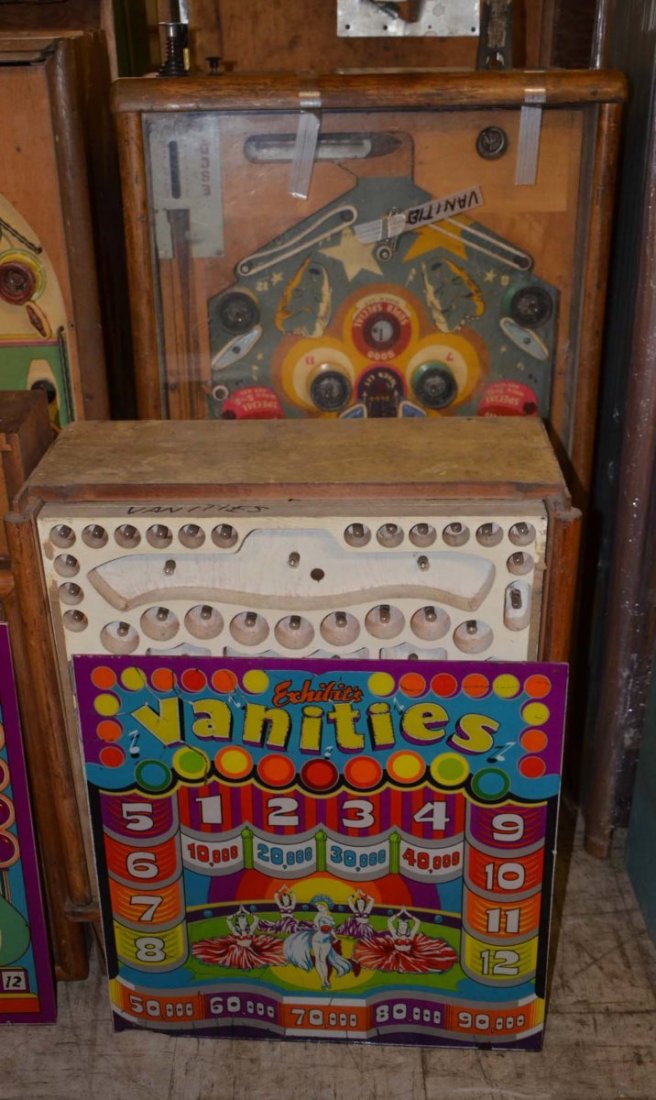 1947 Exhibit Vanities.: Playfield: Good. Backglass: Fair. Cabinet: Fair. Functionality: Untested.