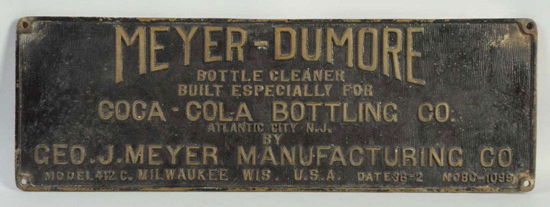 Meyer-Dumore Coca-Cola Sign.: This cast metal sign advertises the Meyer-Dumore bottle cleaning machine for Coca-Cola bottles. Some minor paint loss here and there. Condition (Very Good). Size 27" L.