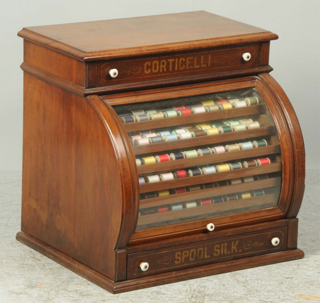 Corticelli Thread & Bow Front Display Cabinet.: This Corticelli thread cabinet has only very minor overall wear. Displays well. Condition (Excellent). Size 20 - 1/2" L.