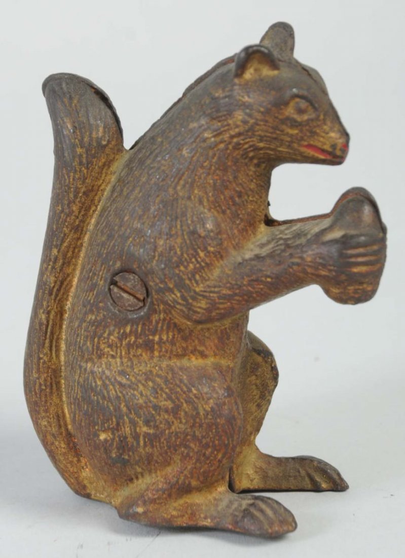 Squirrel with Nut Cast Iron Still Bank.: Condition (Very Good). Size 4" L.