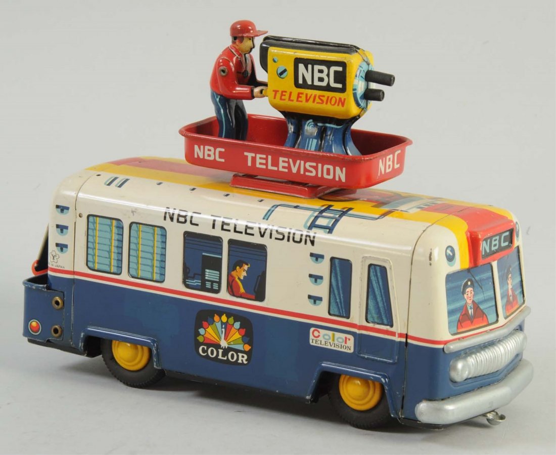 Japanese Tin Battery Operated NBC Television Bus.: Toy has some slight scratches towards the bottom. Otherwise, there are almost no visible scratches to the litho . Battery compartment is very clean with no oxidation. Includes levers towards the