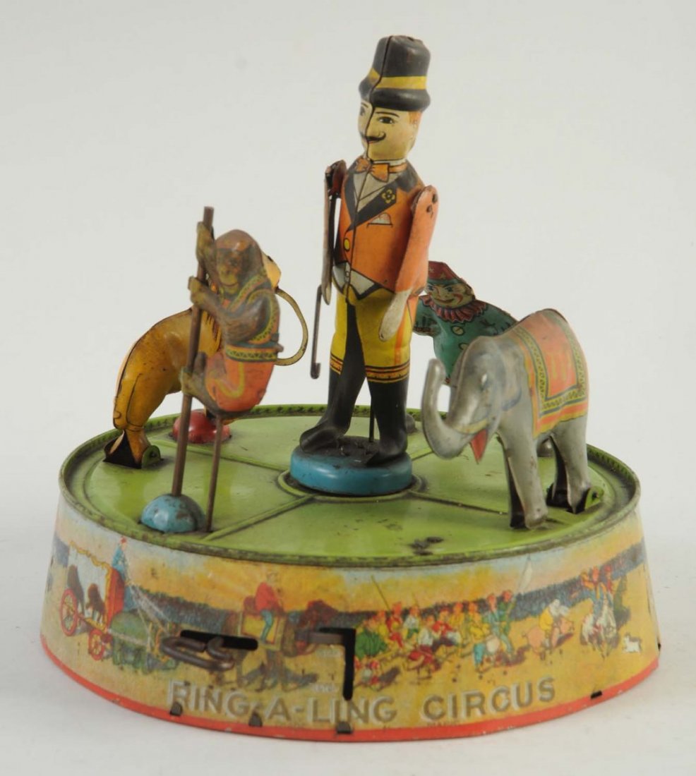 Marx Tin Wind-Up Ring- A-Ling Circus.: The toy has scratches throughout, especially to the edges, base, and animals. There is also some color fading to the litho. Otherwise, the toy has nice colors and litho. Overall, it is a nice and