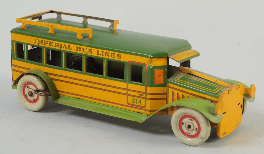 Tin Wind-Up Bus.: Some minor scratches to the top and towards the front. Bottom of the bus is in great condition with no scratches or dents. Nice tin litho colors, mainly in green and yellow. Very attractive and