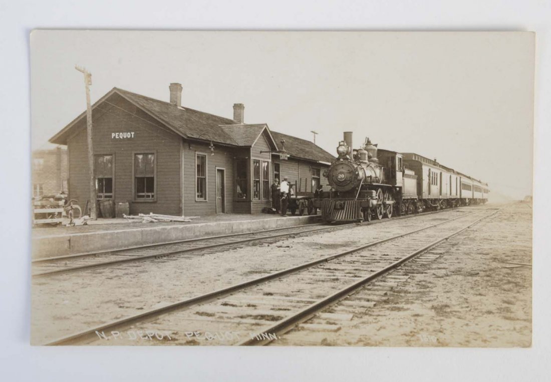 Pequot Minnesota Railroad Train Depot RPPC.: Real photo postcard shows the railroad train station at Pequot, Minnesota. N. P. (Northern Pacific) railroad depot. Uncancelled. Condition (Very Good).