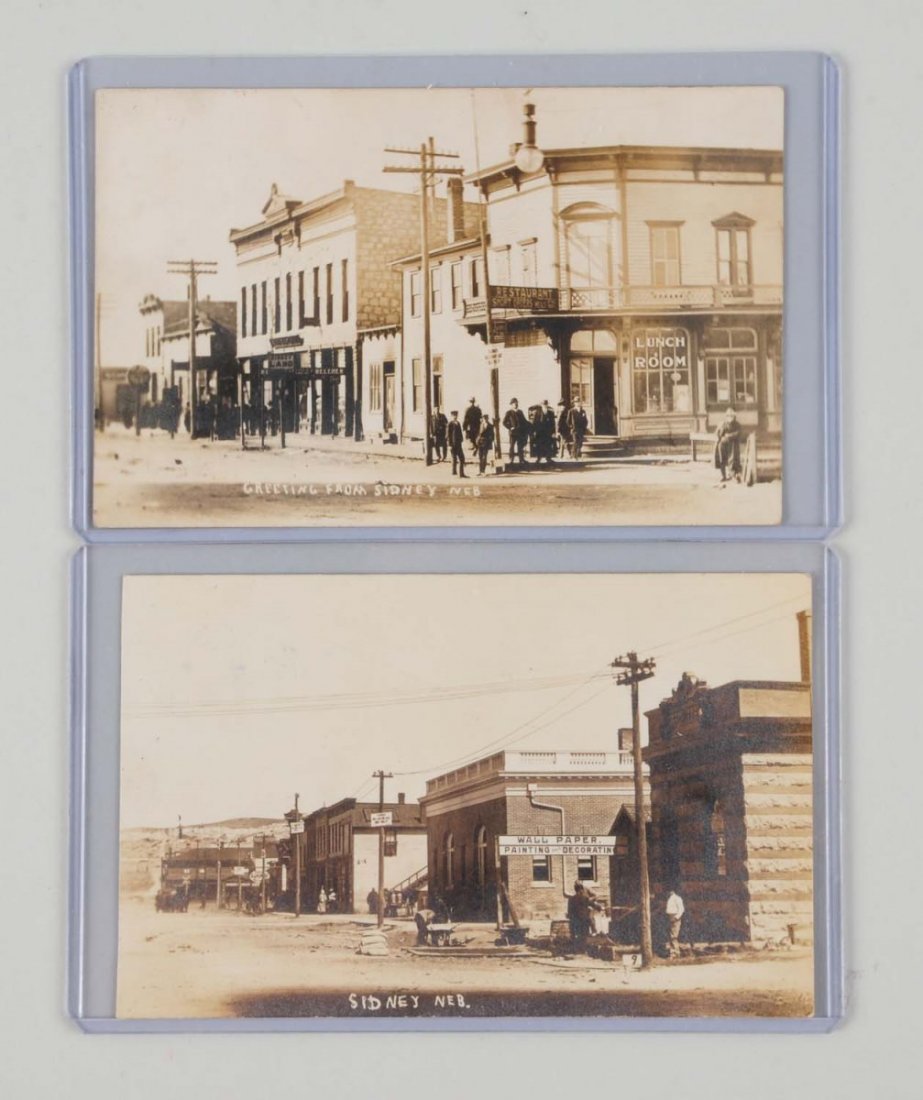 Lot of 2: Sidney Nebraska Butcher Photo Postcards: This lot includes two S.D. Butcher real photo postcards depicting scenes in Sidney, Nebraska. Condition (Excellent).
