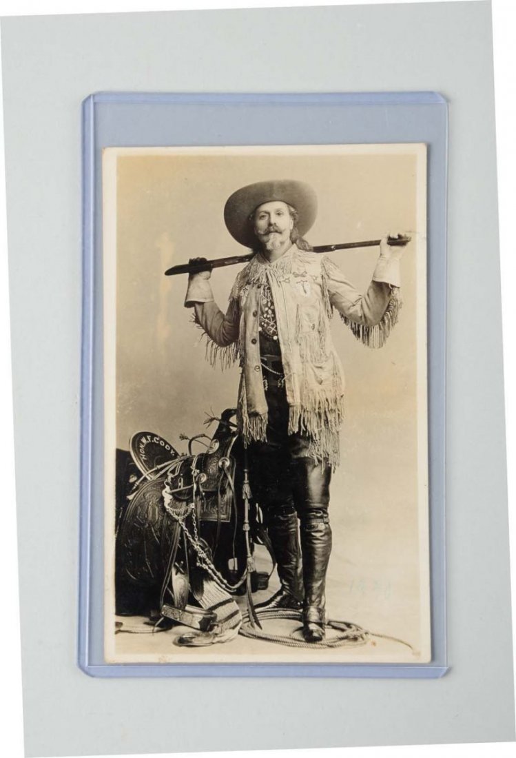 Buffalo Bill Cody Studio Real Photo Postcard.: This real photo postcard depicts William F. "Buffalo Bill" Cody. This is a studio image and pictures Cody with his saddle, lasso, and gun, and dressed in his full show regalia. The card is uncancelled