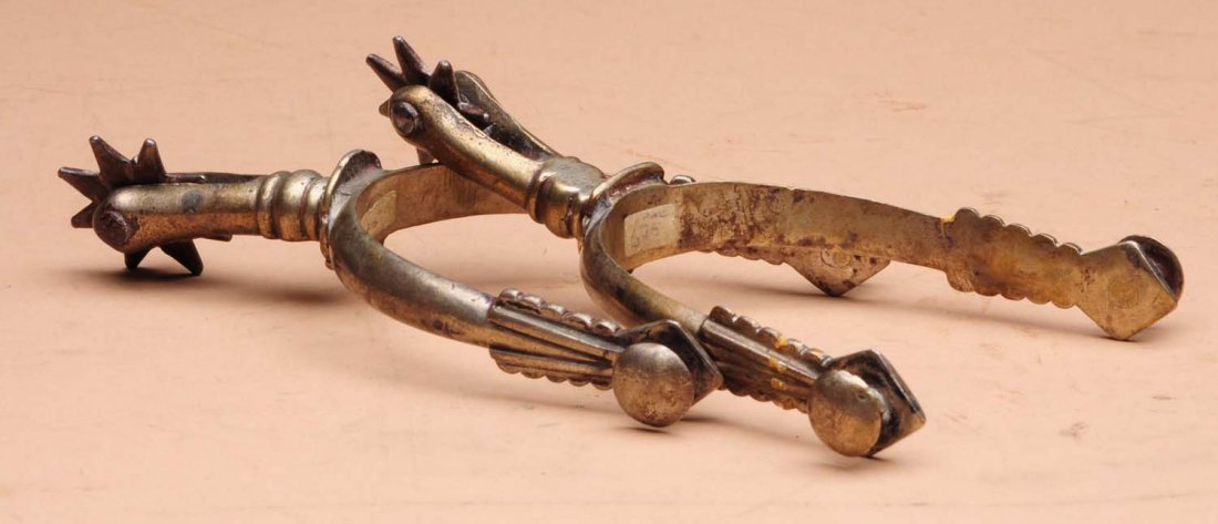 Pair of Spurs.: This pair of spurs is unmarked. Light overall wear. Condition (Very Good). Size 6" L.
