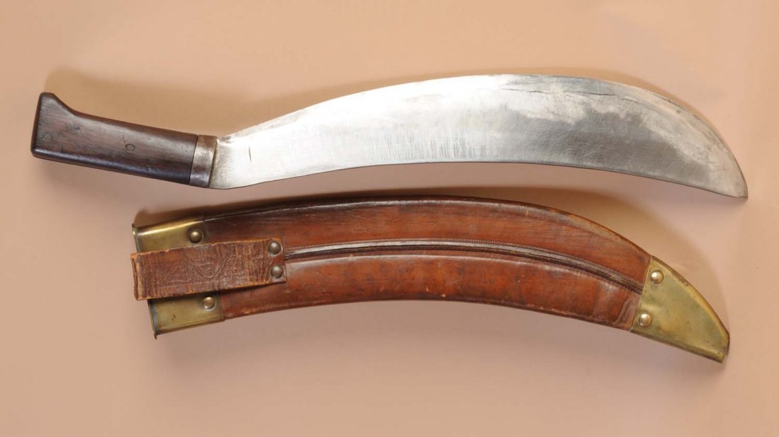 Bush Cutting Machete.: Unsigned Collins machete with a 15" blade, 20" overall length, wood handle, and original unsigned sheath. Condition (Excellent). Size 21" L.