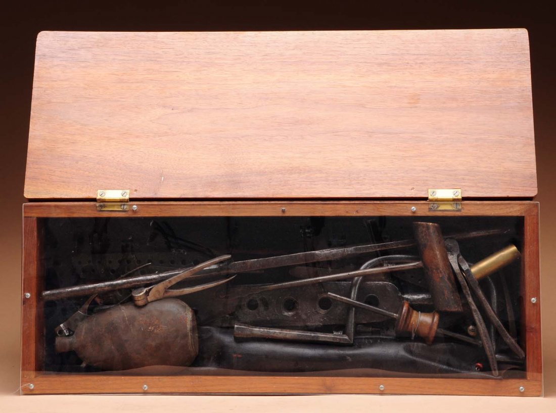 Lot of Early Cast Iron Gun Making Tools.: This lot includes a variety of early cast iron gun making tools. A wooden display box is also included. Condition (Very Good Plus). Size 24" L.