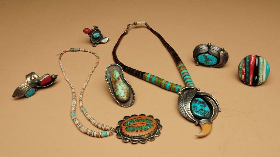 Lot of 3: Indian Made Jewelry.: Circa 1970s. One is initialed "L.B." on the back, the others have no marks. One small Santo Domingo with inlaid walnut stone. One turquoise ring, the stone in the ring has some cracking. All other sto