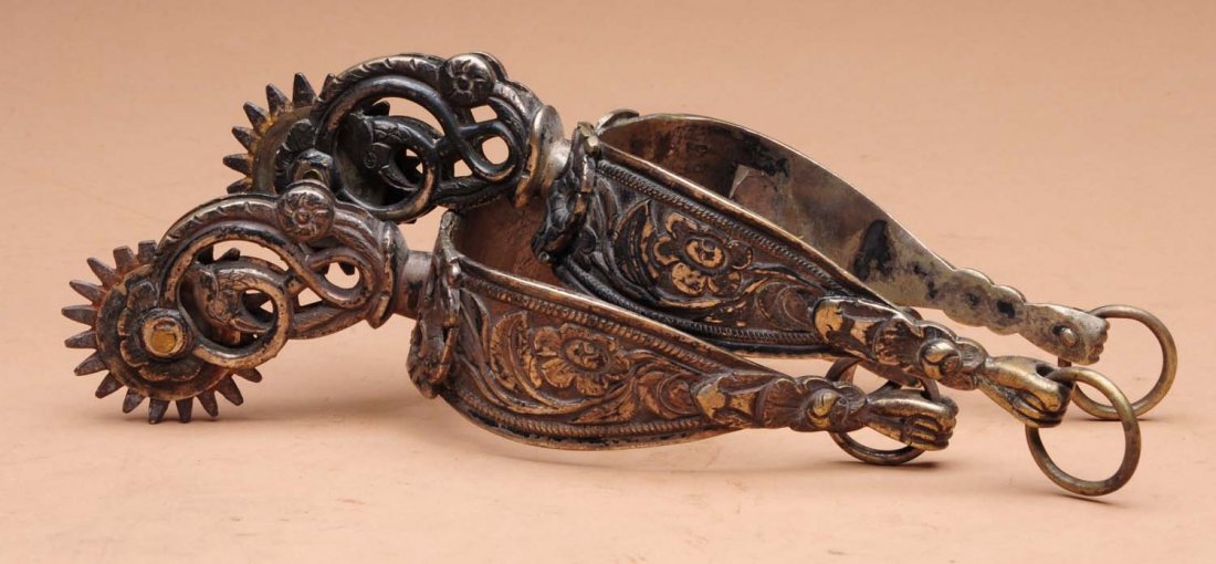 Pair of California Spurs.: This pair of spurs is unmarked. Light overall wear. Condition (Very Good). Size 6 - 1/2" L.