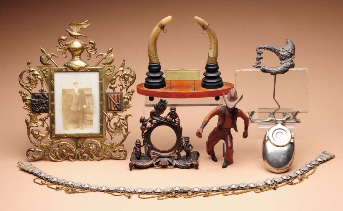 Lot of Assorted Items of Interest.: This lot includes an ornate woman's belt, several figural picture frames, a carved wooden cowboy and other items. Condition (Very Good Plus). Size Largest: 29" L.