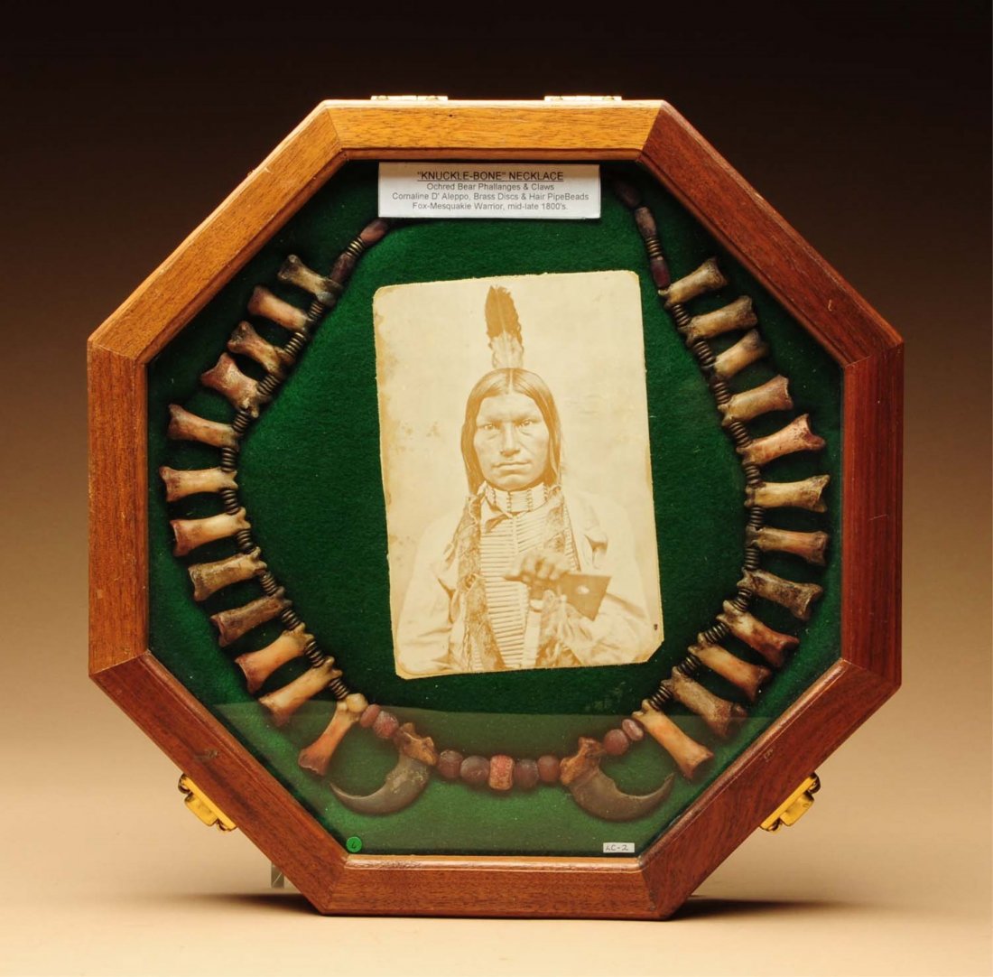Framed Necklace with Photo of Sioux Chief.: Deer knuckle bones, bear claws, brass and glass trade beads. Frame says 18th century, but more likely 20th century. Condition (Good). Size 13" L.