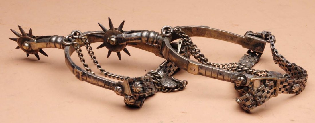 Pair of Spurs Marked H.A.: This pair of spurs is marked H.A. Minor wear. Condition (Very Good Plus). Size 6 - 1/2" L.