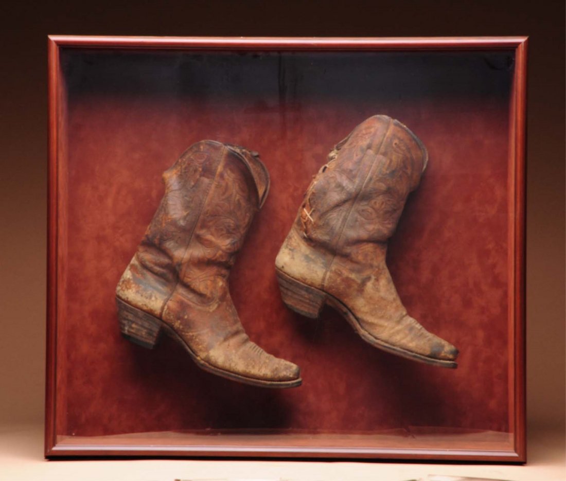 Shadowbox with Cowboy Boots.: This shadowbox contains a well worn pair of early cowboy boots. Condition (Good). Size 25" x 22".