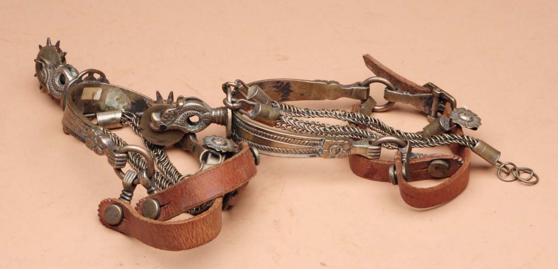Pair of California Style Spurs.: This pair of spurs is unmarked. Light overall wear. Condition (Very Good Plus). Size 6 - 1/2" L.