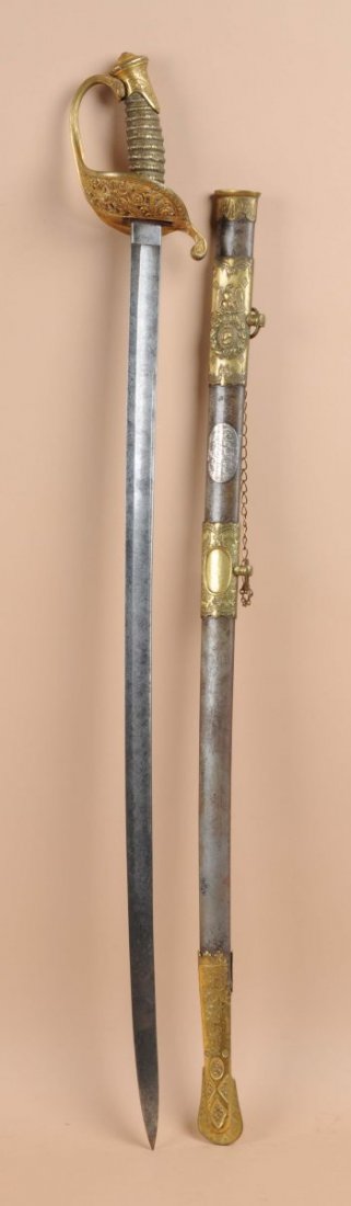 Alexander Bobb Civil War Presentation Sword.: Manufactured by Collins & Company Hartford 1862. The sword has an ornate brass hilt and hand guard. Etched blade turning patina. Steel scabbard has overlay civil war motif with a George Washington bus