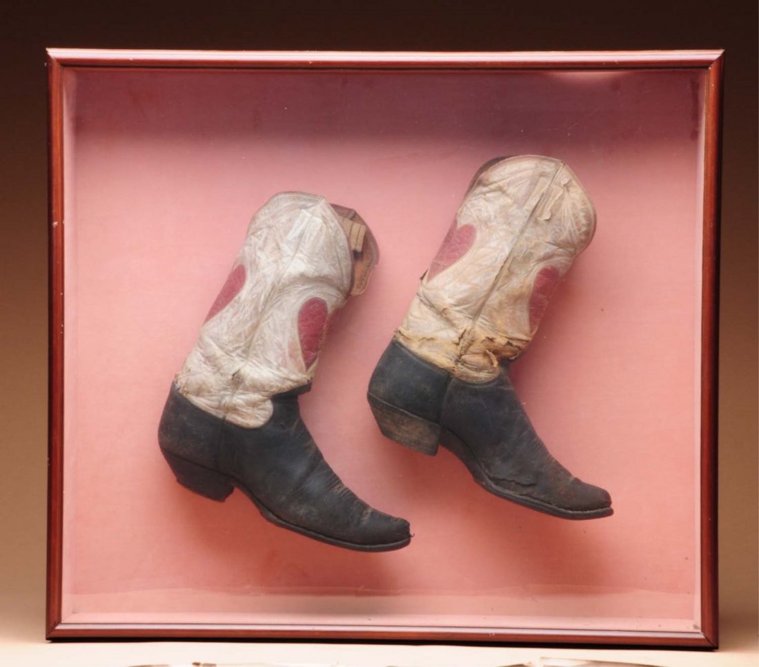 Shadowbox with Cowboy Boots.: This shadowbox contains a well worn pair of early cowboy boots. Condition (Very Good). Size 25" x 22".