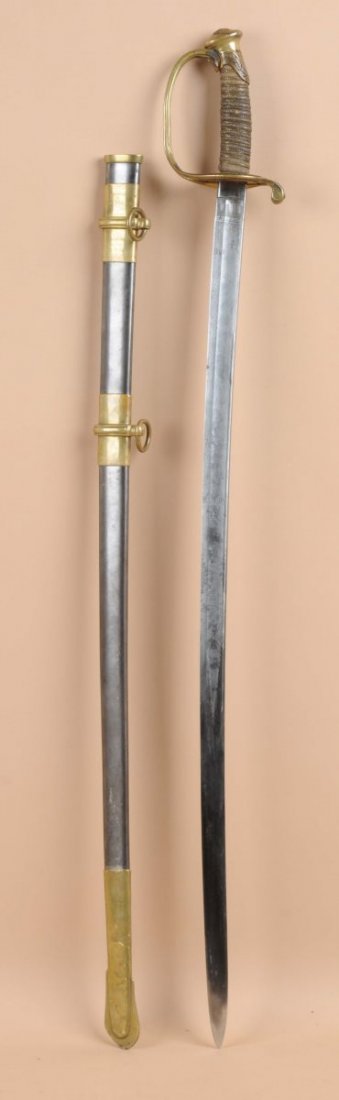 Capt. Samuel D. Shipley Civil War Presentation Sw: Presentation sword manufacture by C. Roby & Co. Mass. Features a US themed etched blade, wire shark skin wrapped handle, brass hilt, plain brass appointed metal scabbard. Engraved “Presented to Capt