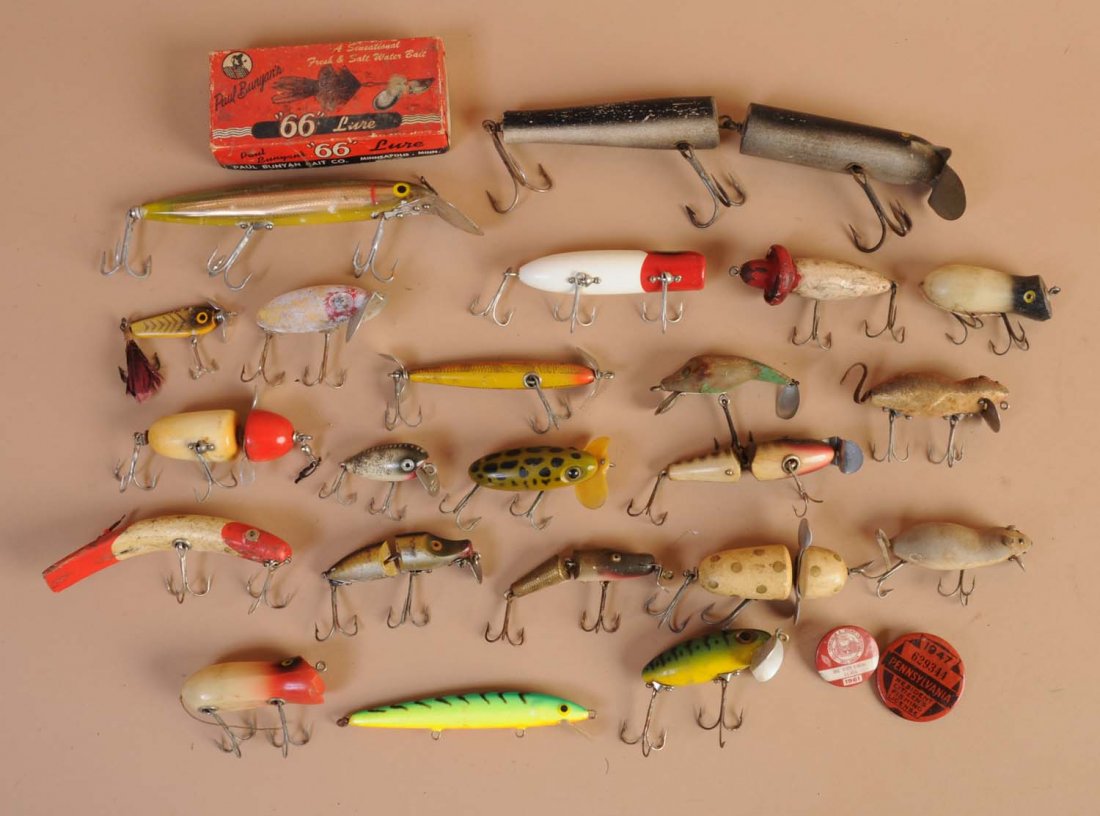 Lot of Fishing Lures.: This lot includes several jointed lures and numerous other wooden and plastic lures. Condition (Very Good). Size Largest: 8" L.