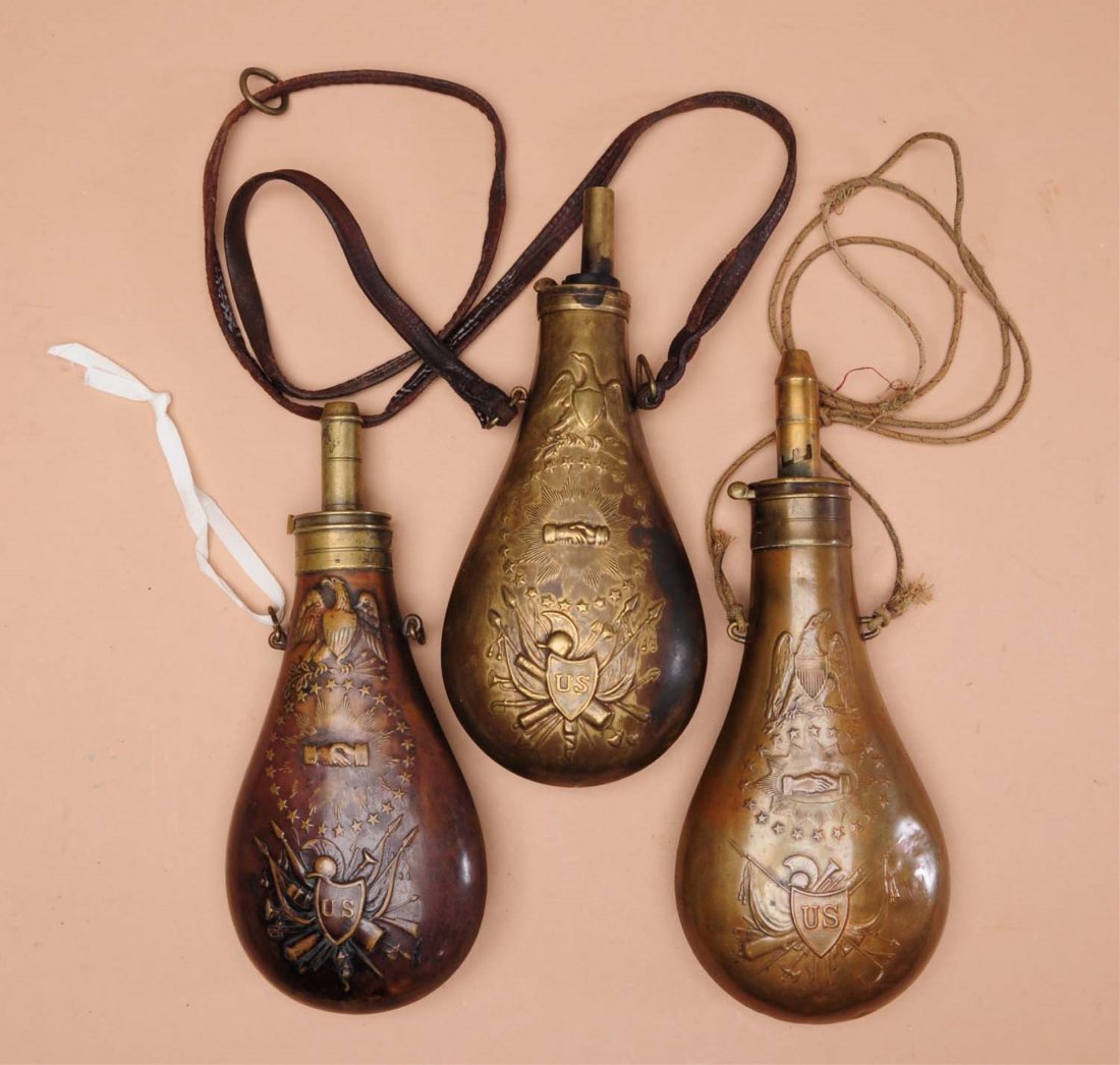 Lot of 3:Original Large US Embossed Powder Flasks: Three nice original US embossed powder flasks, large sized for large caliber rifles and following pieces. One is marked “MP Ames 1838”, one is marked “Batty 1850” and the third is unmarked. Al