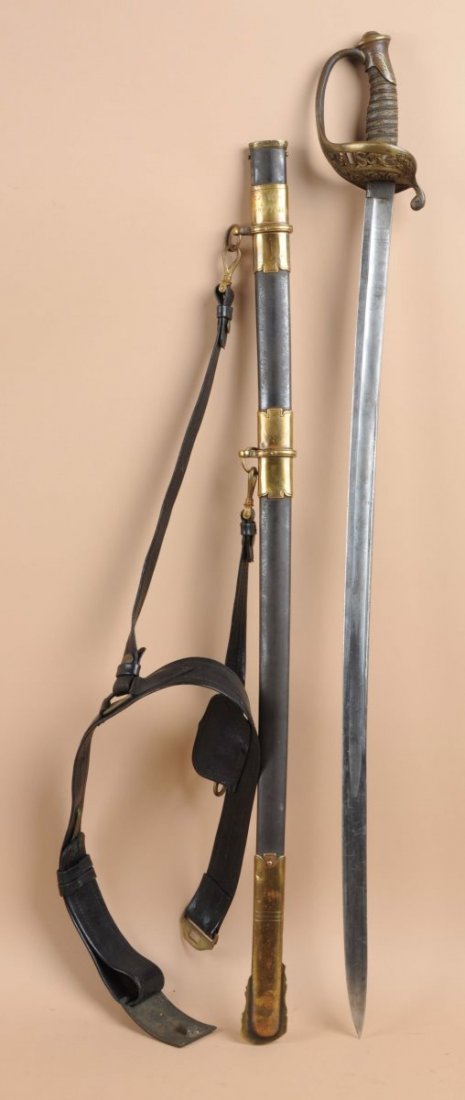 Henry Middle Civil War Presentation Sword.: No visible maker stamp. Patriotic flag and US Civil War motif etched blade. Henry Middle punched dot engraved on scabbard. Has US embossed hand guard. Shark skin, wire wrapped handle. Comes with US le